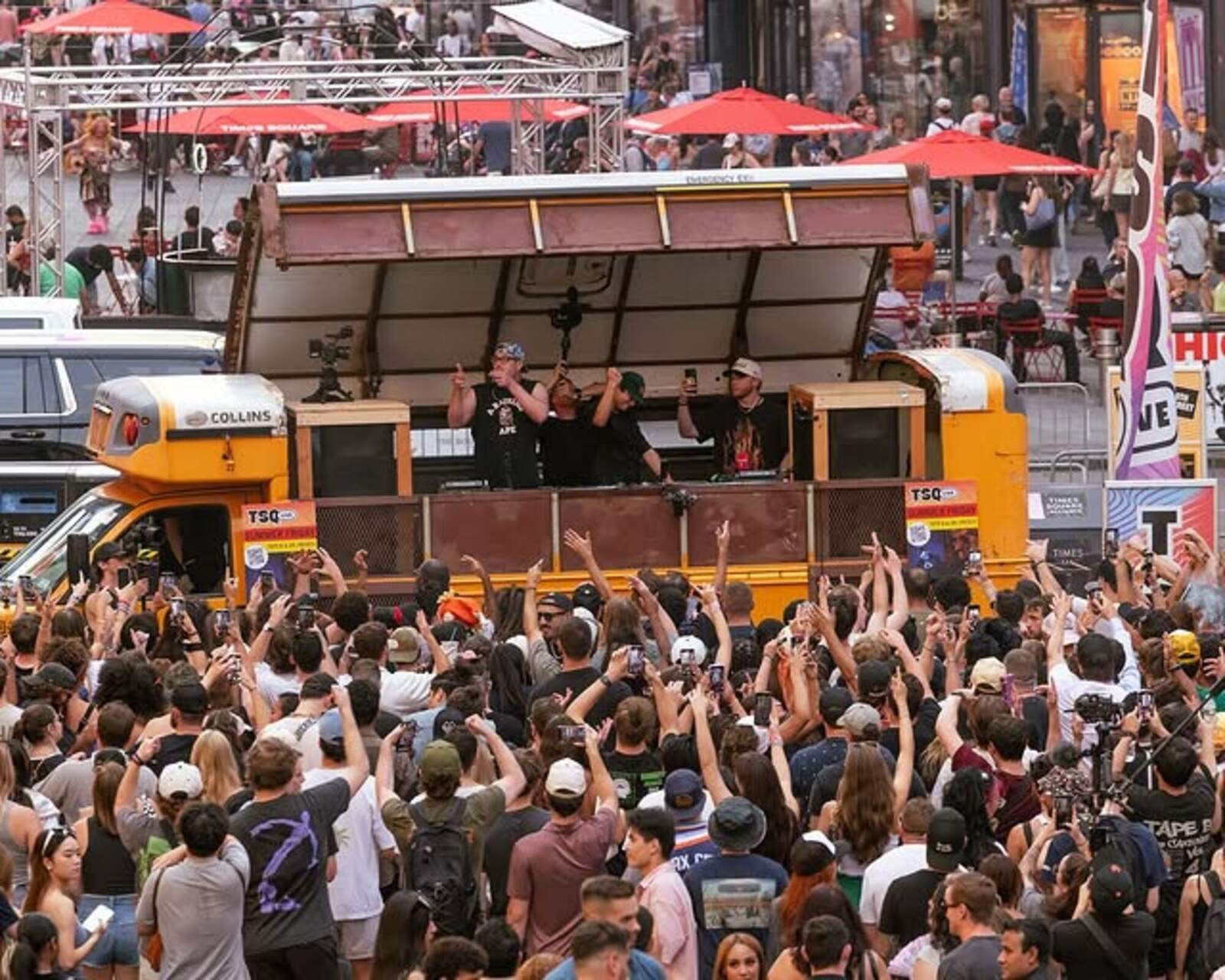 The City Soul Bus in Times Square surrounded by thousands of fans