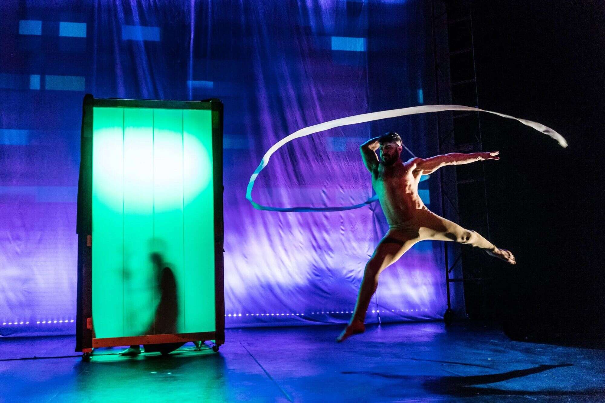 Green glow — mirror booth and ribbon