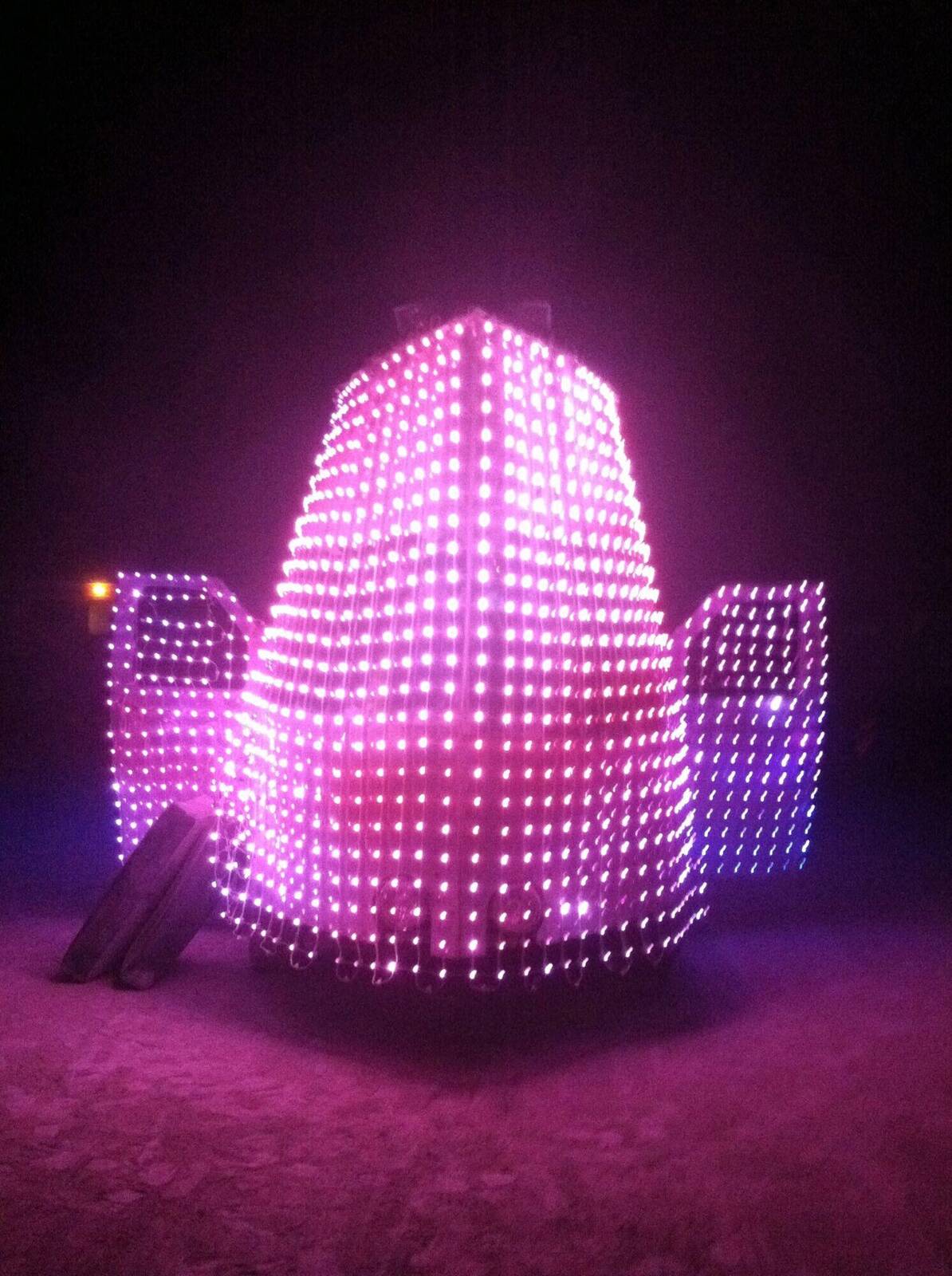 Night — full LED coverage, purple and pink generative content