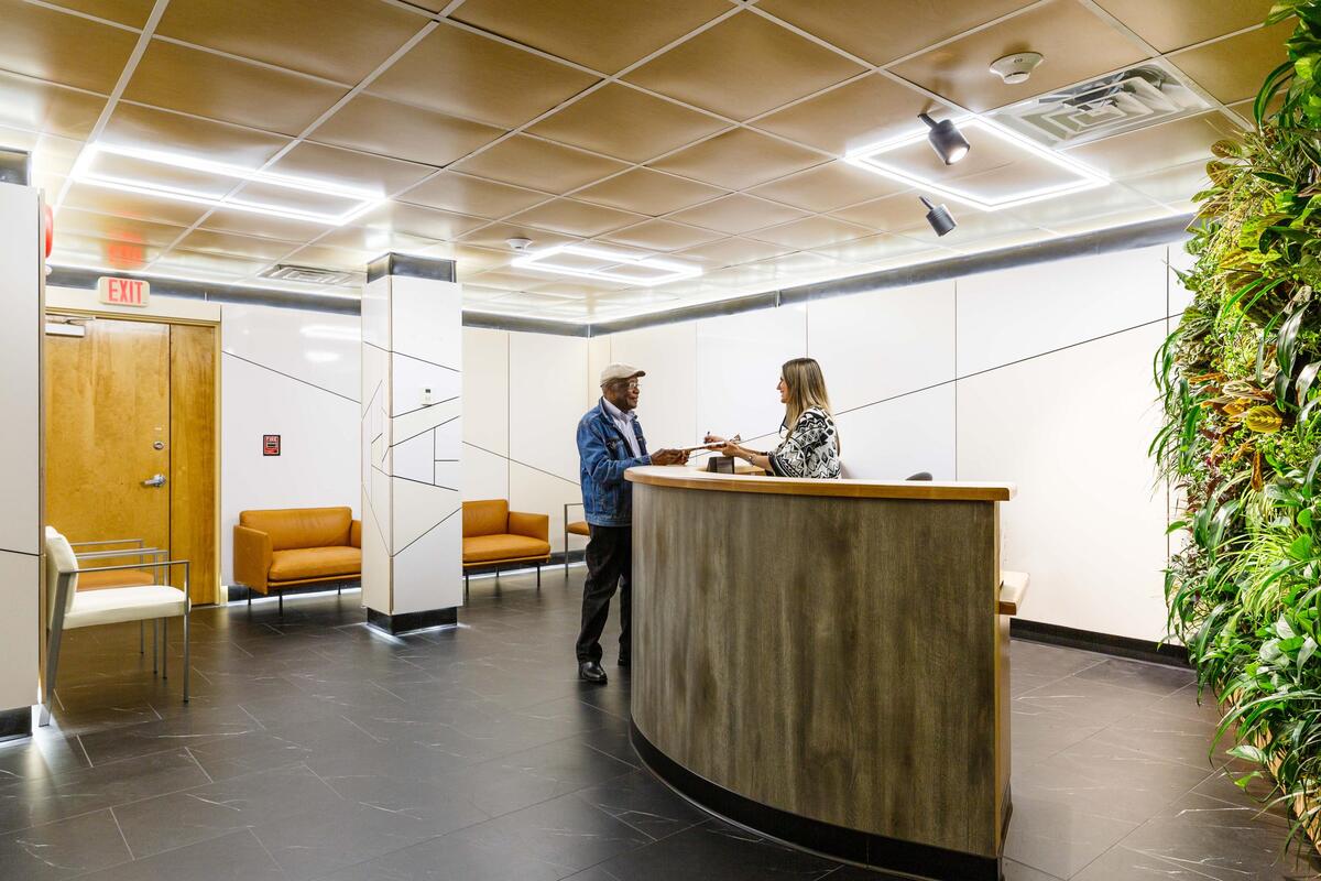 Patient checking in at reception