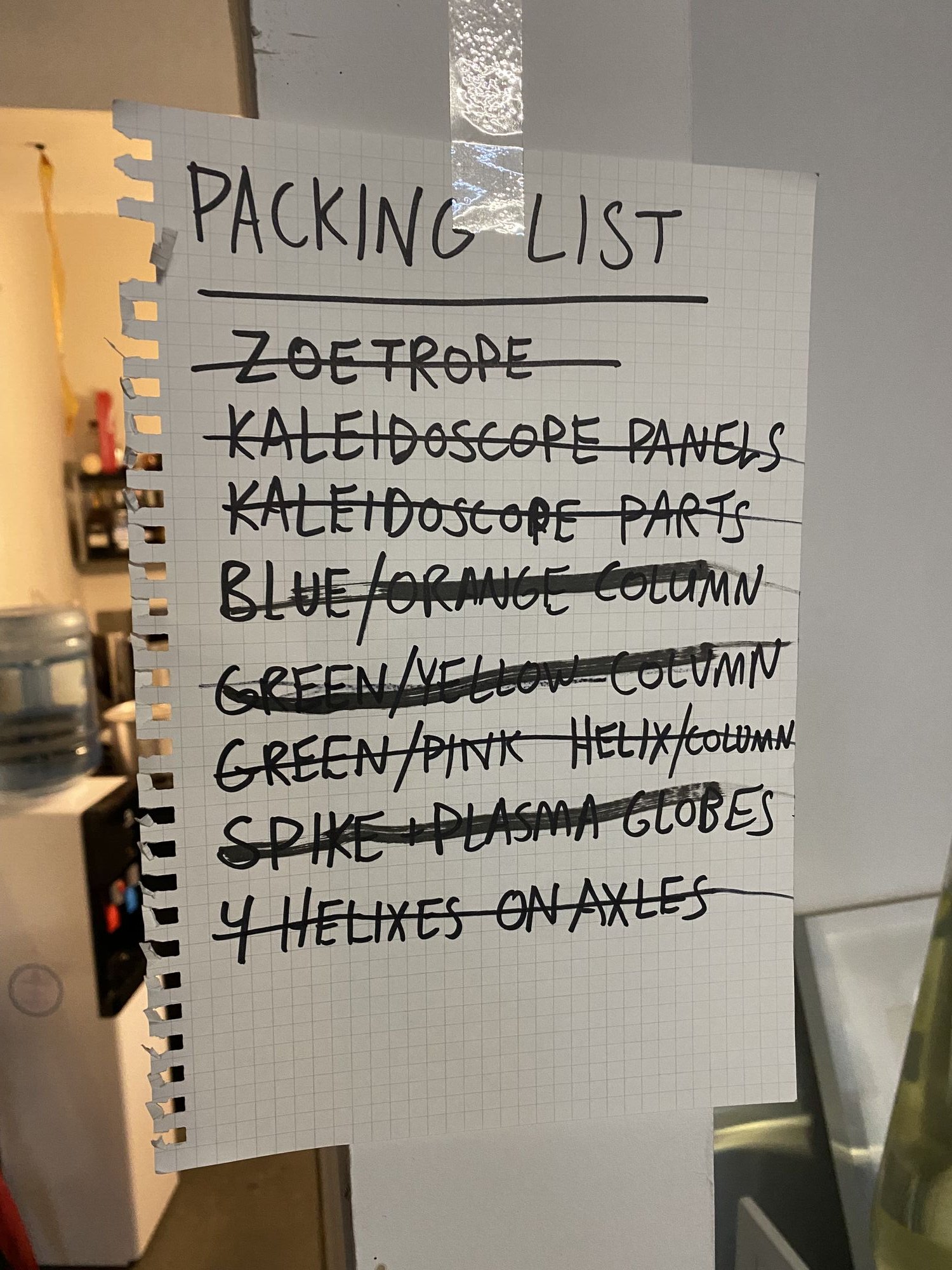 Handwritten packing list — zoetrope, kaleidoscope panels, columns, helixes on axles